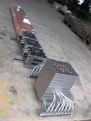 Linea di estrusori per pavimenti in legno e plastica composita con capacità 150-200 kg/h